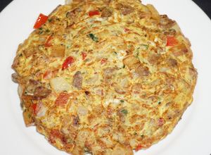 Una foto de Tortilla de papas con longaniza