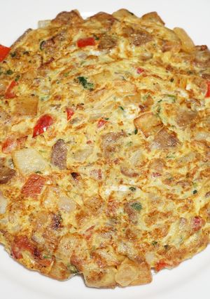 Una foto de Tortilla de papas con longaniza