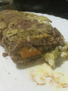 Una foto de Rollo de carne picada y verduras