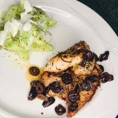 A picture of Baked Chicken and Olives.