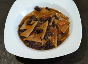Foto di Maltagliati di polenta bianca e grano saraceno con fagioli neri