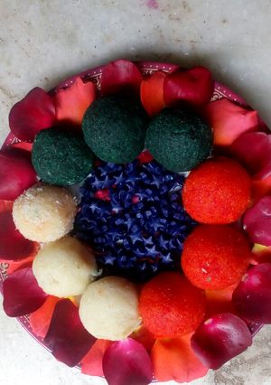 A picture of Tricolor Nariyal Ladoo with Gulkand Stuffing.