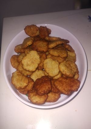 Una foto de Torta fritas de puré de mandioca y harina de arveja