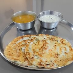 A picture of Vegetable urad dal dosa.