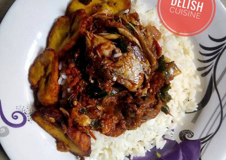 Rice and fish stew with plantain