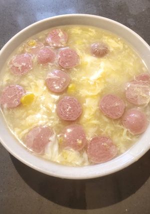 A picture of Corn Soup with Chicken Sausage.