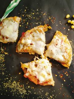 बेल पेपर आणि कॉर्न पिझ्झा (Bell pepper n Corn pizza recipe in marathi) रेसिपी चे मुख्य फोटो