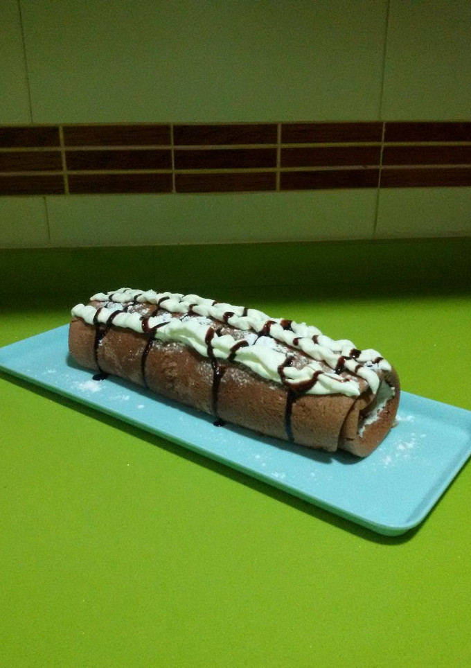 Una foto de Brazo de gitano de choco relleno de nata
