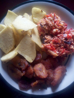 A picture of Fried yam and plantain with scrambled egg sauce.