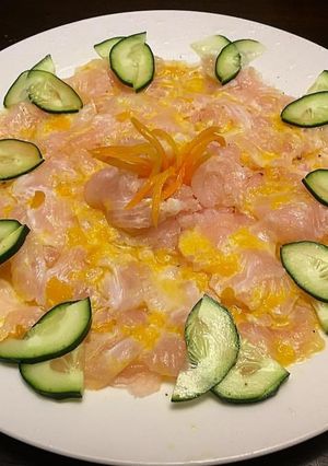 Una foto de Tiradito de Corvina y Ají amarillo