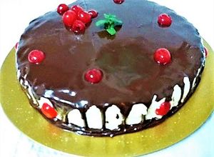 Foto principal de Tarta con crema mascarpone y glaseo de chocolate
