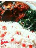 White rice with snail Stew and steamed spinach