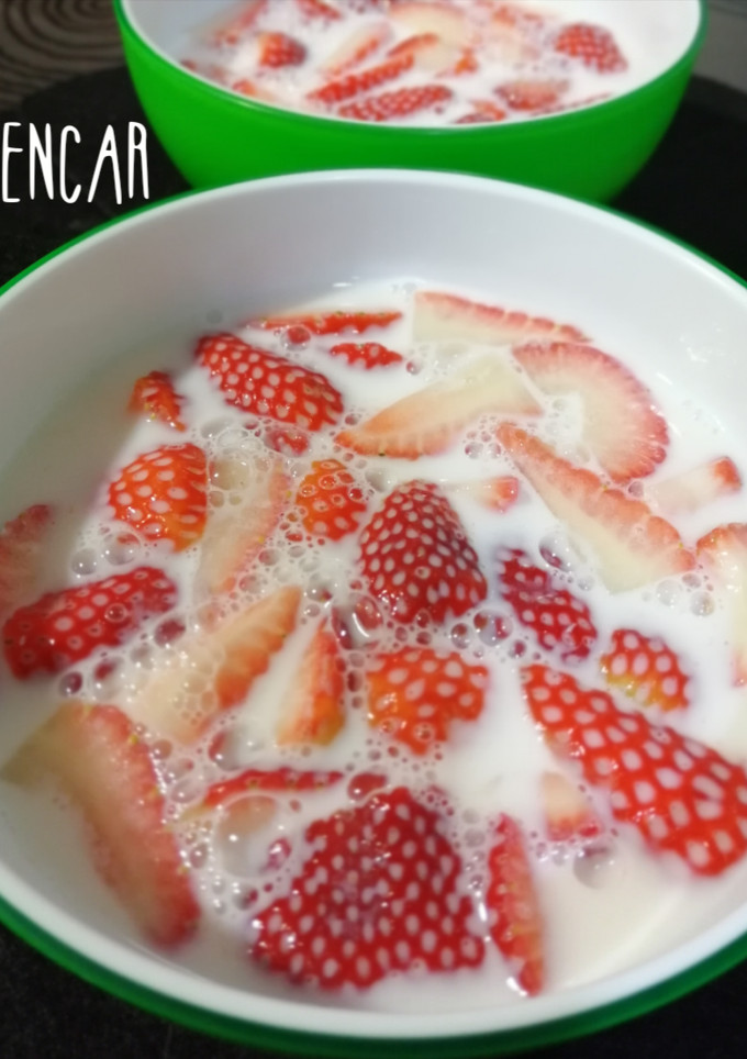 Una foto de Fresas con leche
