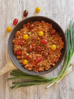 Una foto de Cuscús con tomates al horno