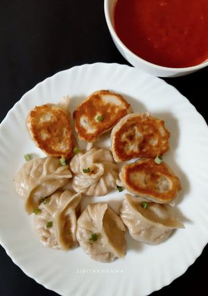 A picture of Kothey Momo with Roasted Garlic Tomato Chutney (Veg).
