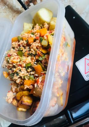 A picture of Title: Fried yam&plantain egg sauce combo.