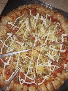 صورة لوصفة بيتزا محشية بالجبن