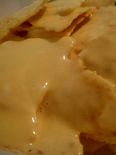 Una foto de Nachos con salsa Nani