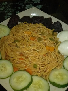 Jollof spaghetti ainihin hoton girkin