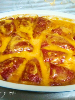 Una foto de Pimientos del piquillo rellenos de merluza y langostinos