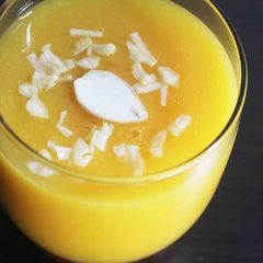 A picture of Almond kulfi and mango smoothie.