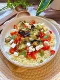 Cuscús con berenjena, queso feta y pesto