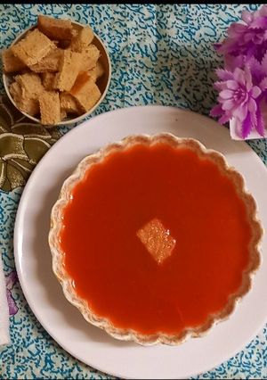 A picture of Carrot and tomatoes soup.