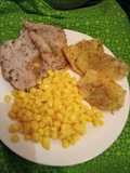 Bisteck de cerdo con papas al horno