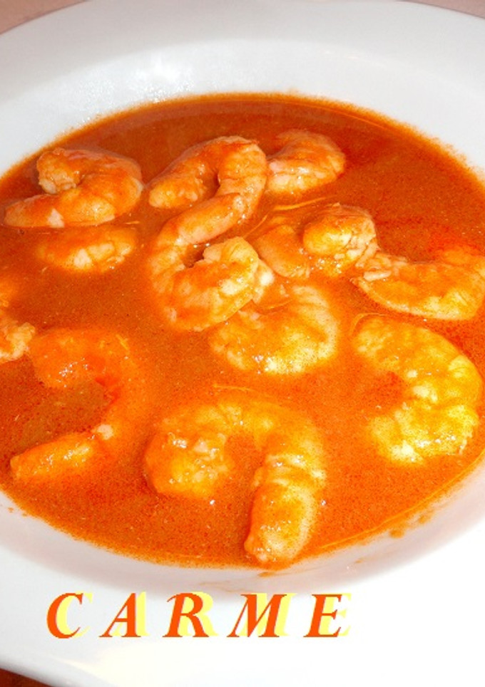 Una foto de Langostinos en salsa