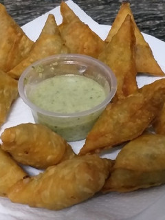 A picture of Paneer Samosas with coconut chutney#authors marathon.