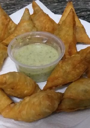 A picture of Paneer Samosas with coconut chutney#authors marathon.