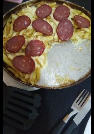 Una foto de Papas fritas a la pizza 🍕🍟