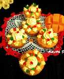Mango cupcakes with tutti frutti