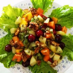 A picture of Fruit salad dressing with Honey chilli sauce.