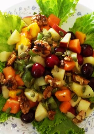 A picture of Fruit salad dressing with Honey chilli sauce.