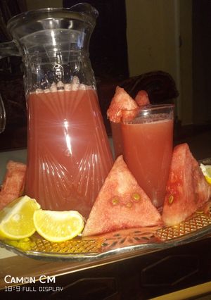A picture of Water melon and orange juice.