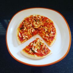 A picture of Maggi Pizza with Whole Wheat and Eggless base.