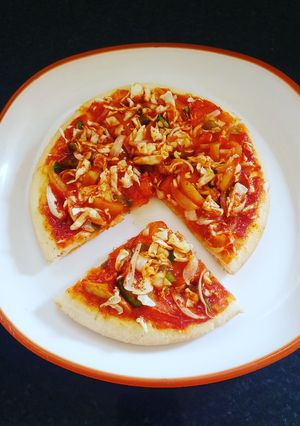 A picture of Maggi Pizza with Whole Wheat and Eggless base.
