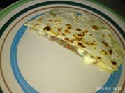 Una foto de quesadillas de carne molida
