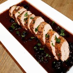 A picture of Black Pepper Crusted Pork Tenderloin With Black Cherry Reduction.