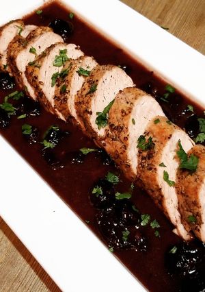 A picture of Black Pepper Crusted Pork Tenderloin With Black Cherry Reduction.
