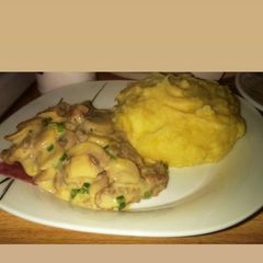 A picture of Creamy Mushroom meatball sauce and mashed potatoes.
