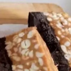 A picture of Caramel chocolate peanut Chikki peanut bar.