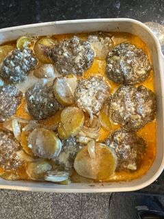 A picture of Kofta in tahini sauce.