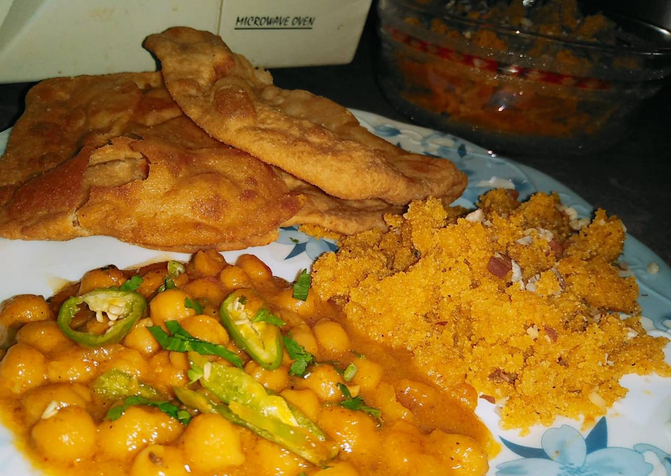 Cholay batory with halwa puri
