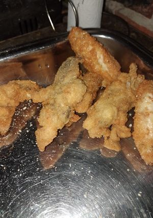 Una foto de Alitas de pollo fritas ✨😜