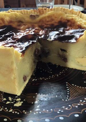 Une photo de Flan pâtissier aux raisins de corinthe et vanille pâte brisée au rhum