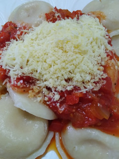 Una foto de Sorrentinos de jamón y queso