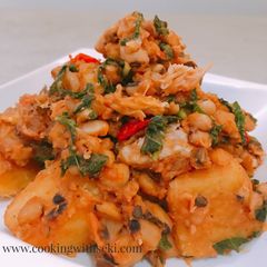 A picture of Kiddies meal.. yam/beans with shredded smoked titus fish veg.