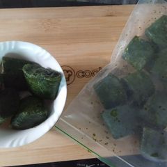 A picture of Green masala chutni frozen cubes.